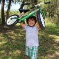 Cruzee-Balance-Bike-Green-with-White-Wheels-Lift.jpg