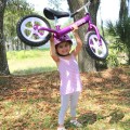 Cruzee-Balance-Bike-Purple-with-White-Wheels-Lift.jpg